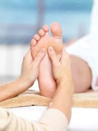 Foot being massaged